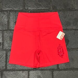 Free People Never Better logo biker shorts red size small NWT